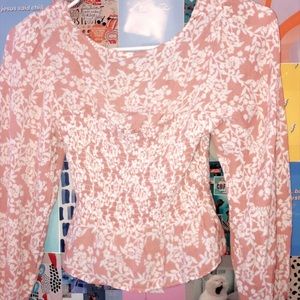 im selling a pink floral, long-sleeve, light weight shirt